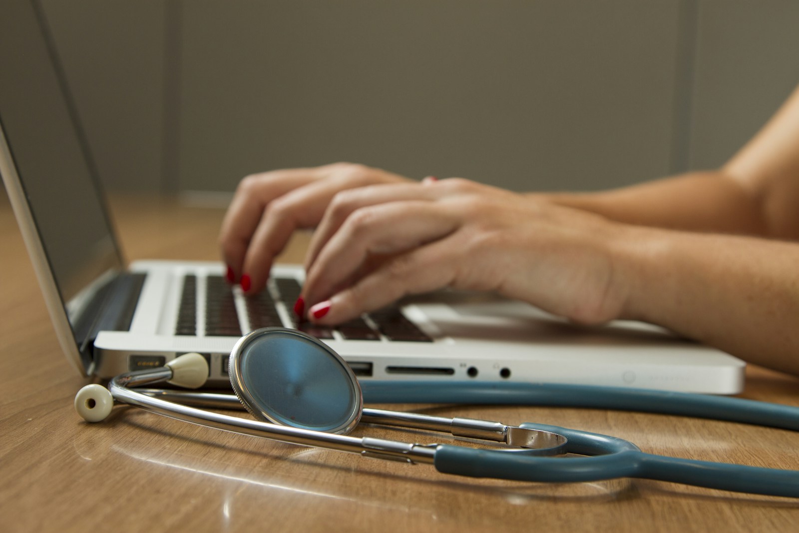 Doctor and nurse supporting a patient